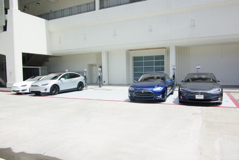 Teslas parked outside