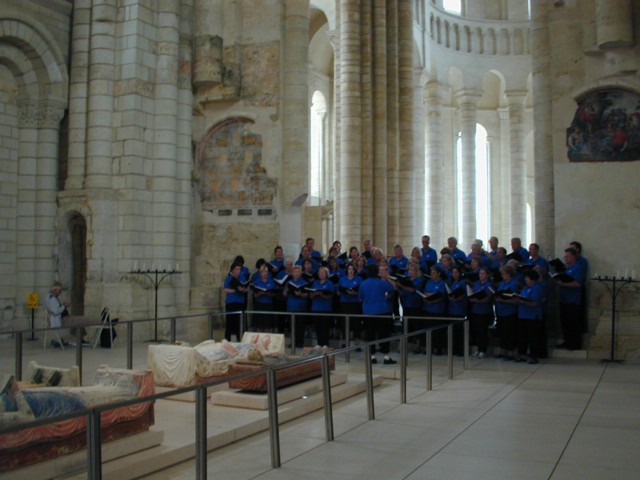 Singing beside the effigies